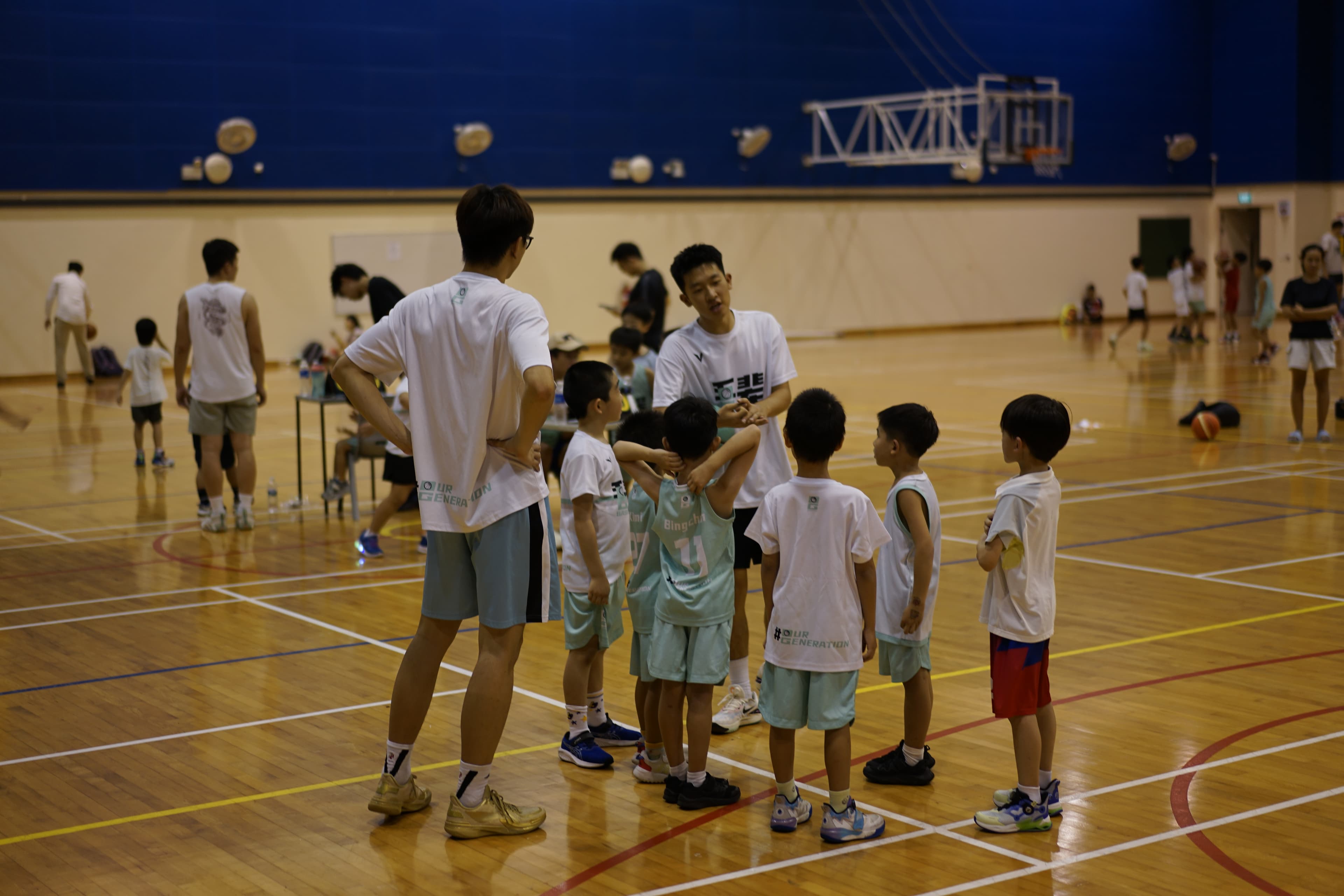 Coach coaching young players