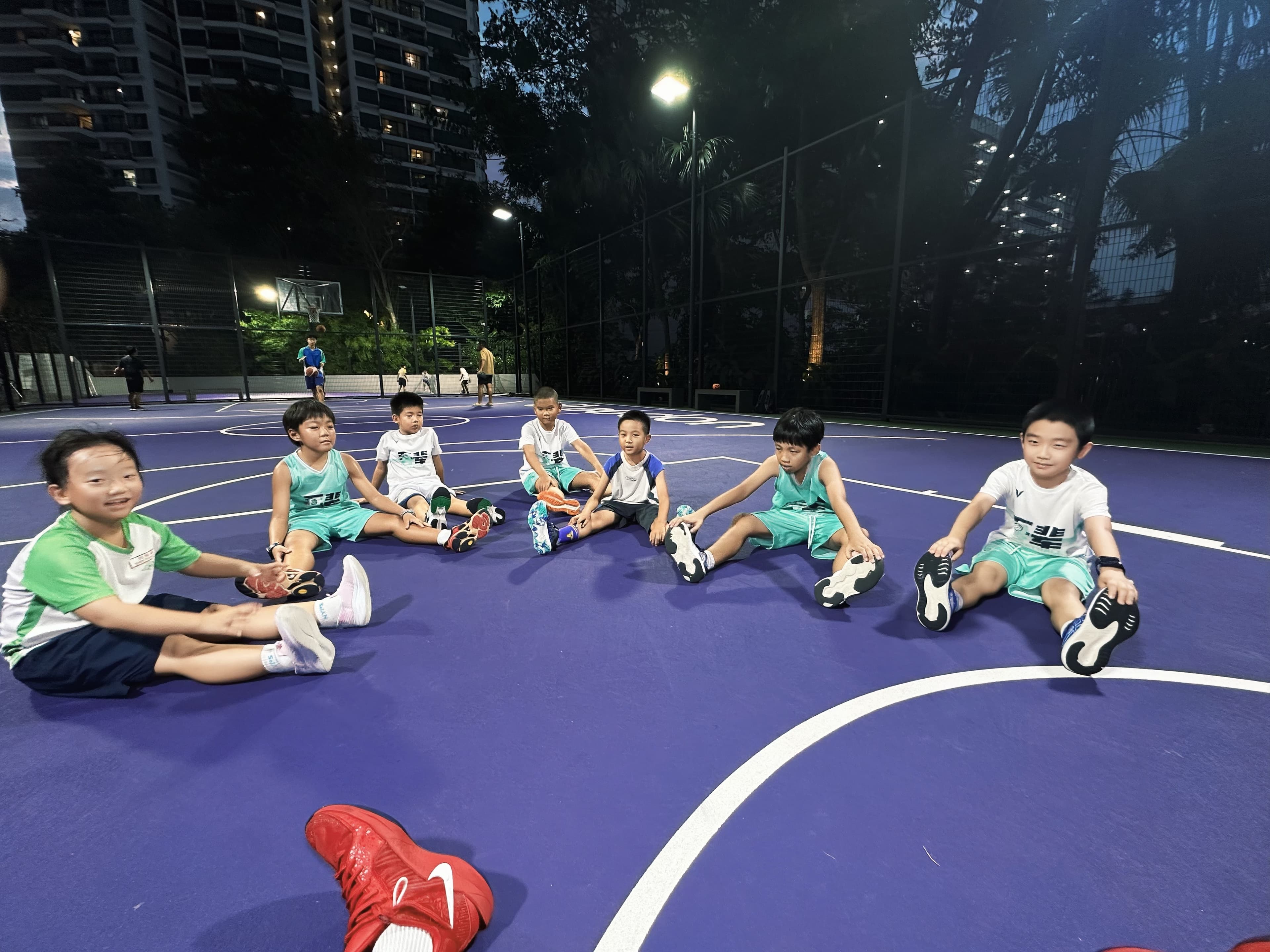 Players stretching after training